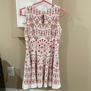 Red and white floral type of design dress